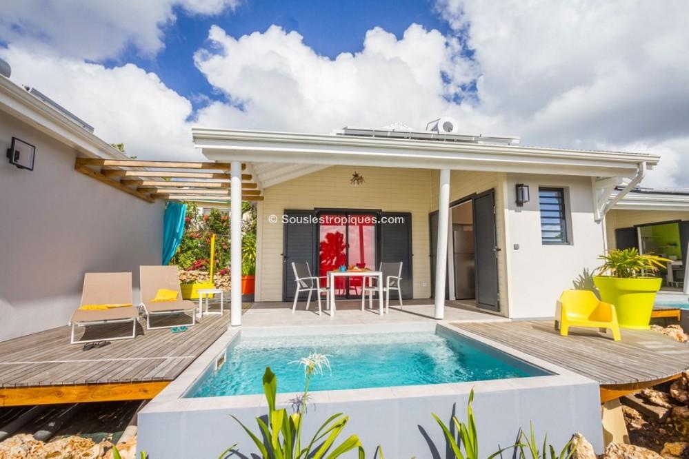 Location villa à Sainte Anne en Guadeloupe sur Souslestropiques ref HG105B